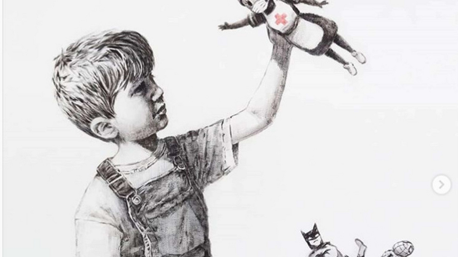 Immagine di Il bimbo di Banksy gioca con i supereroi. E sceglie l'infermiera