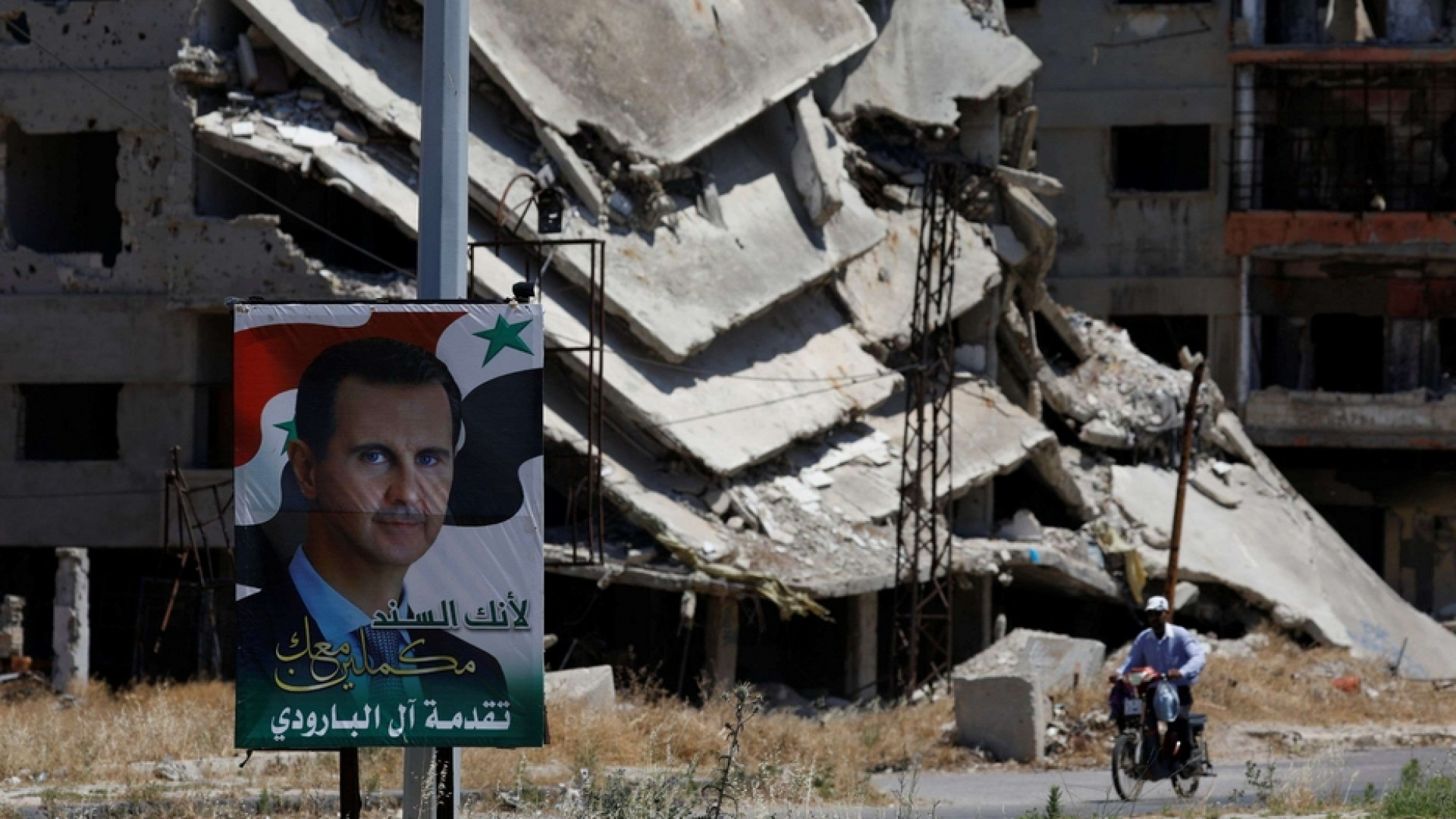 Immagine di Assad verso il quarto mandato, ma senza democrazia