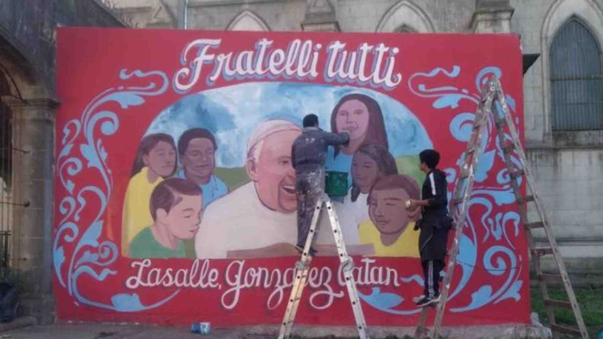 Immagine di La Buenos Aires dei poveri: murales, rap e “Fratelli tutti”