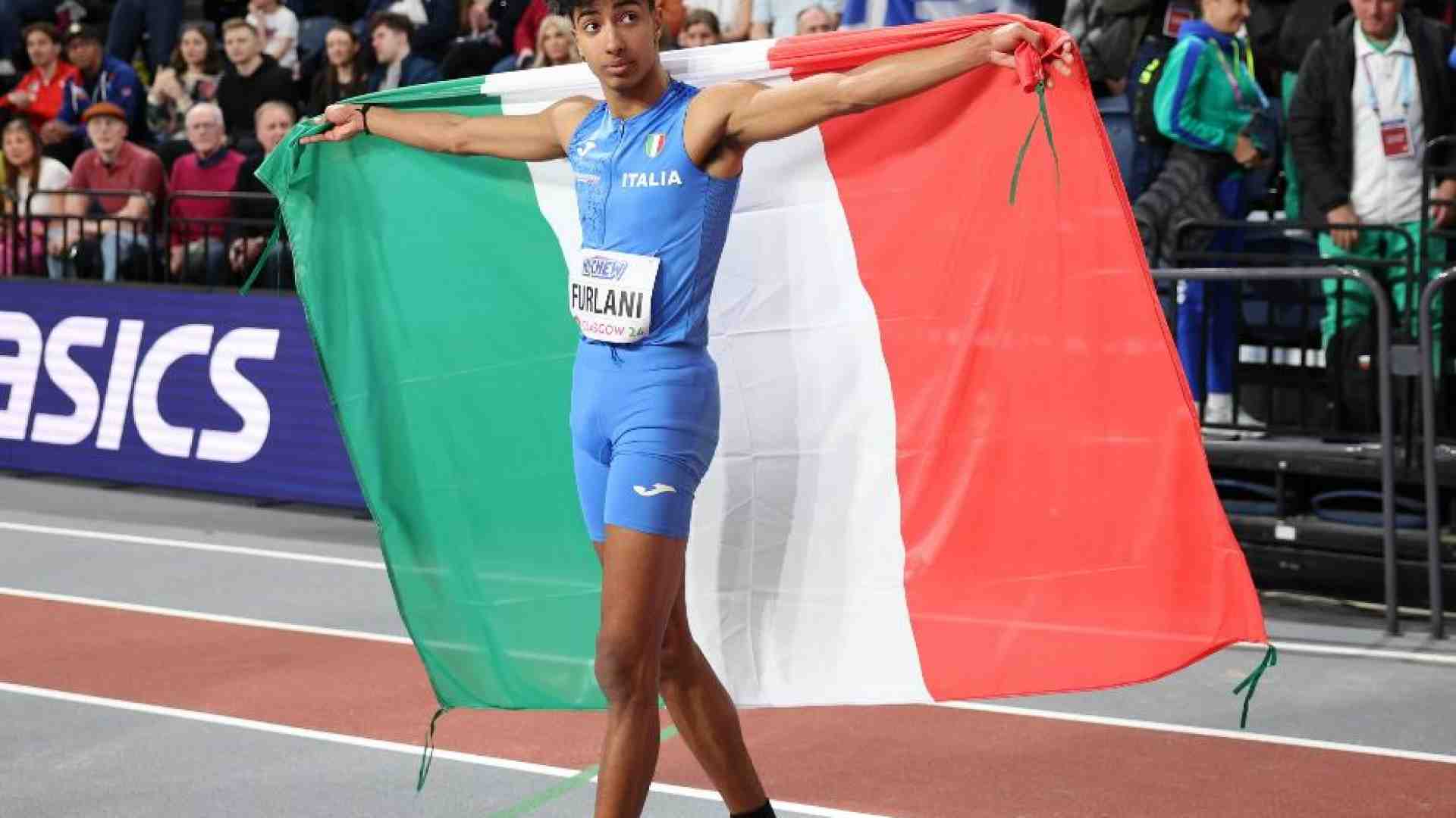 Immagine di Se atleti italiani con la pelle scura sventolano il tricolore