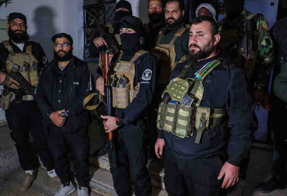 Le forze di sicurezza di Jaramana, in una foto successiva all'attacco al checkpoint (foto Getty) <br />