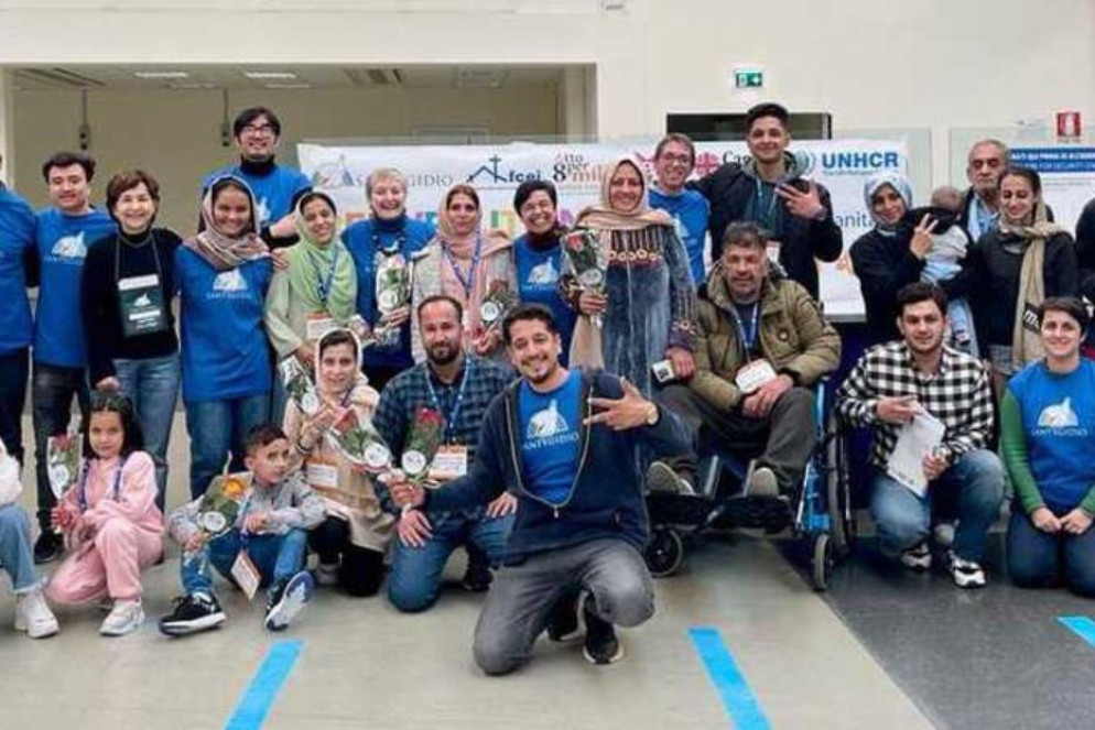 Foto ricordo per profughi e volontari - Comunità di Sant'Egidio