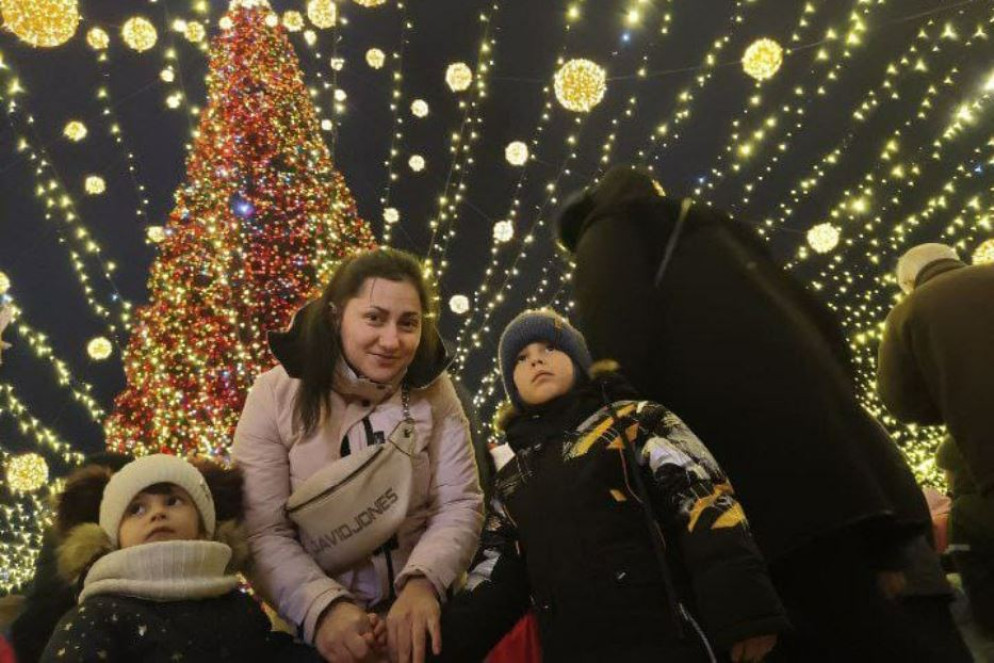 Sabina Lysyshina con i due figli, evacuata da Kherson, che vive a Kiev - Avvenire