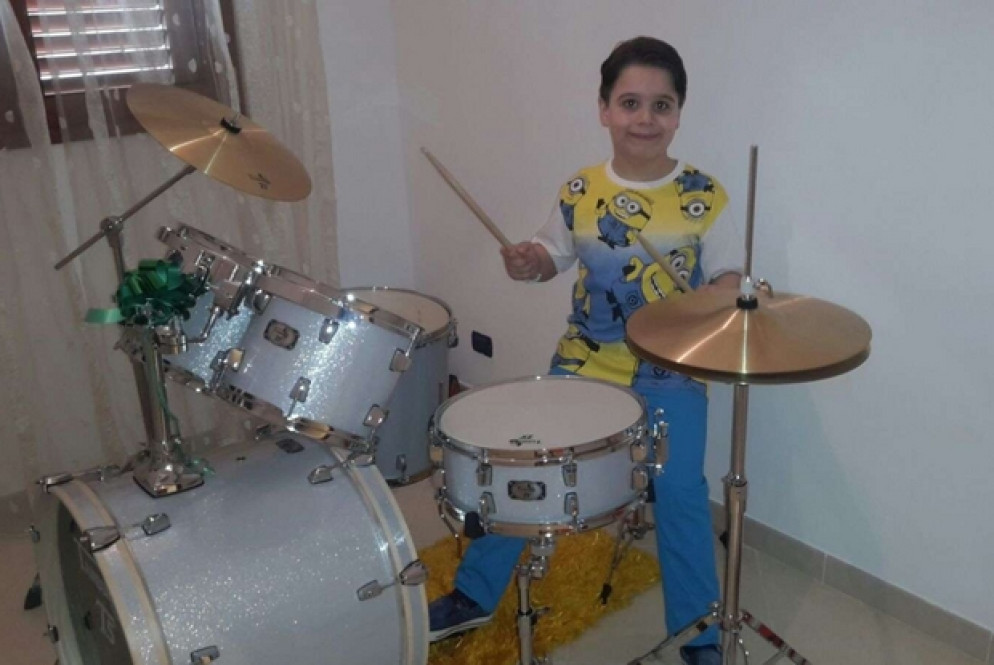 Alessio alla batteria, che era la sua grande passione