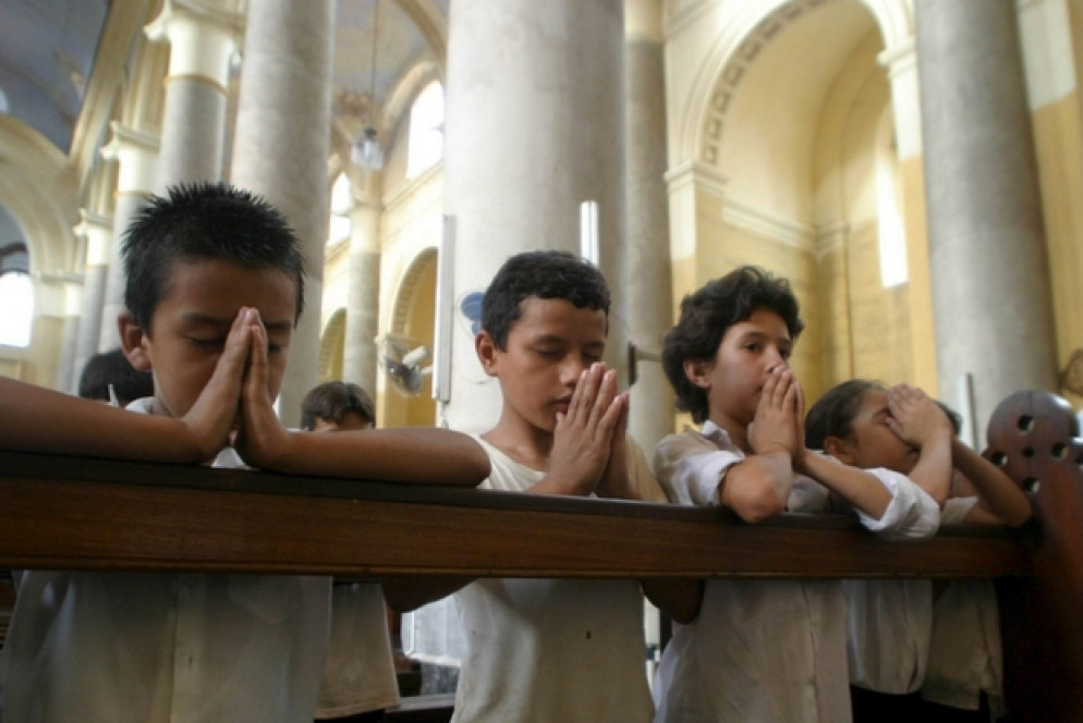 Bambini in preghiera