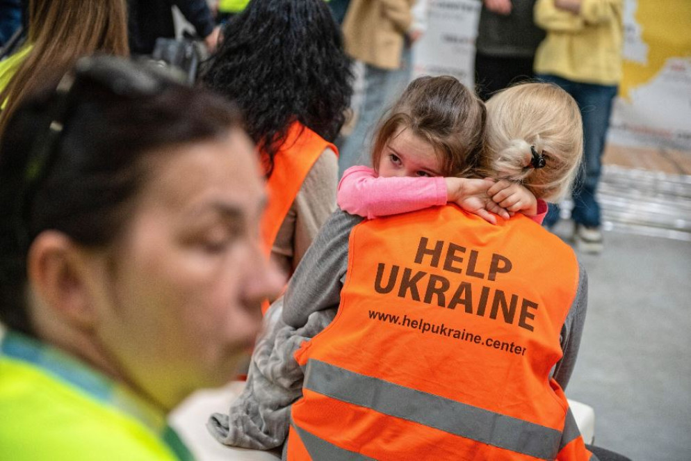 I volontari della Polonia con i profughi ucraini in fuga dalla guerra - Ansa