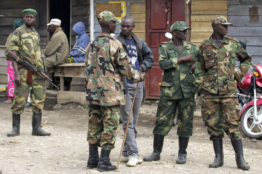 Miliziani del gruppo M23 al confine congolese con il Ruanda - Ansa