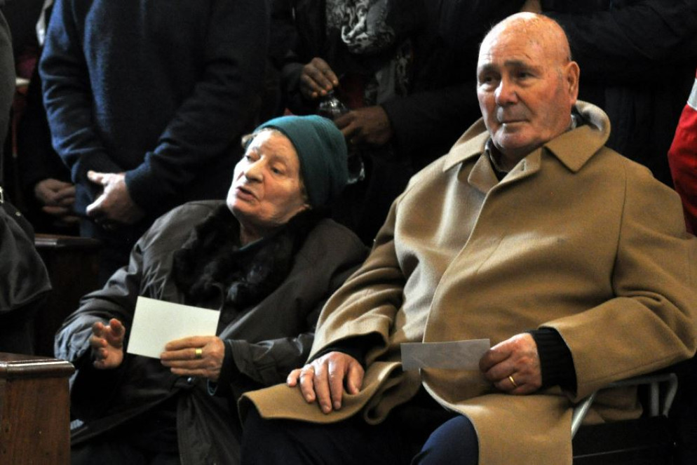 I genitori in chiesa - Fotogramma